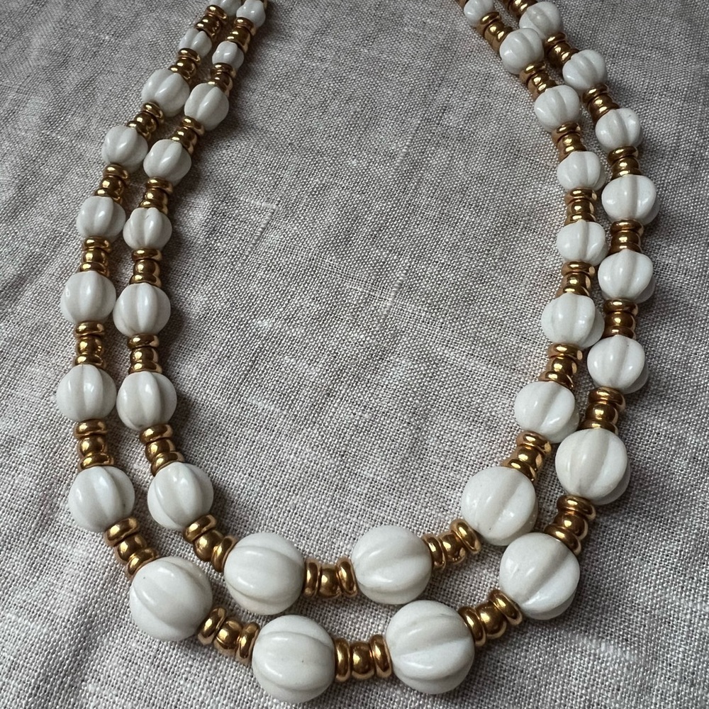 White and gold double strand beaded necklace
